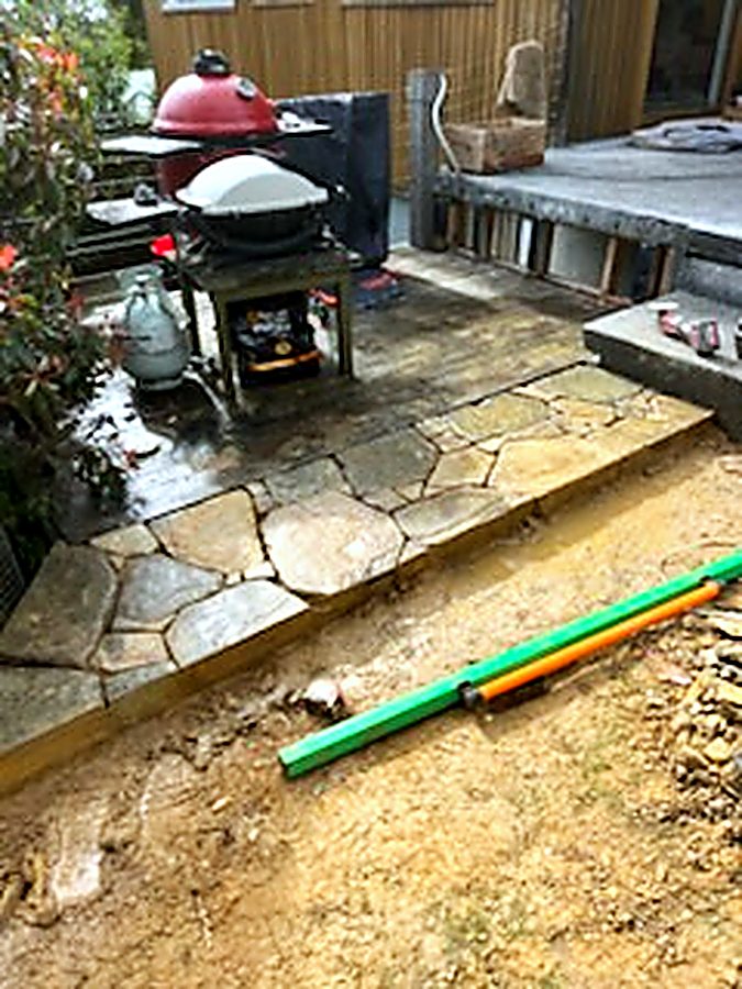 Crazy paving laid to an outdoor kitchen area