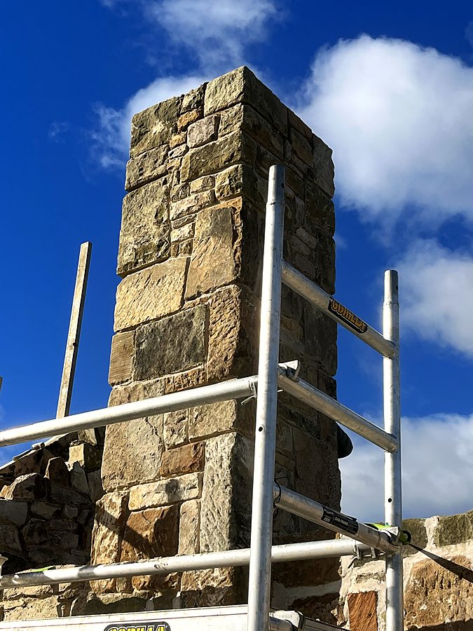 Sandstone chimney rebuilt, seen from the scaffold